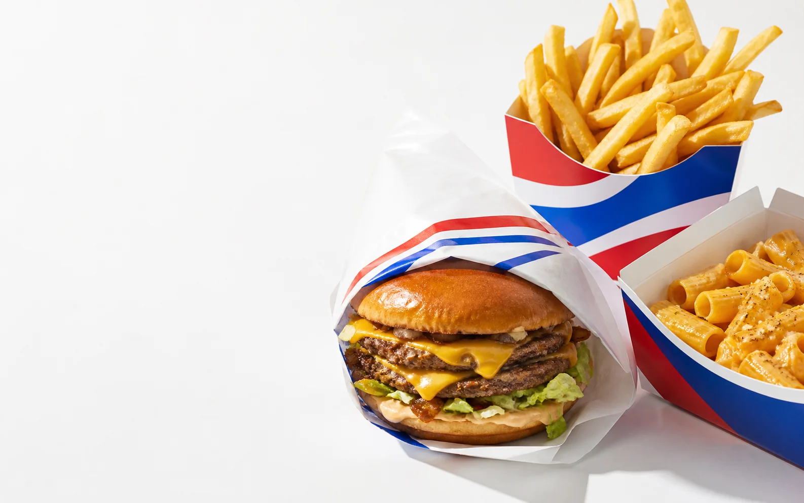 LOOB Smash Burger, Pasta und Fries im Classic-Fast-Food-Look